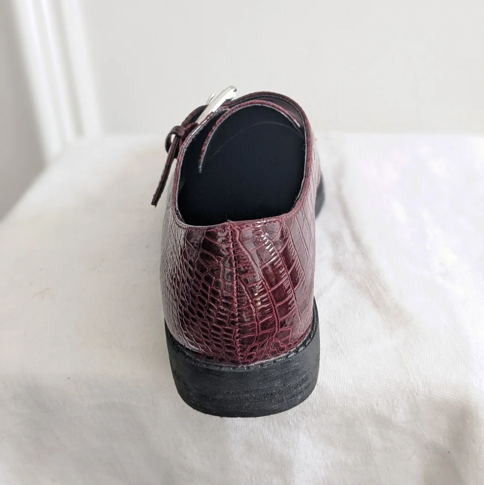 Patent leather loafers by Aldo